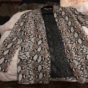 Snake print jacket. Never worn.
